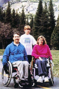 Mom and Dad in Wheelchair with son at National Park